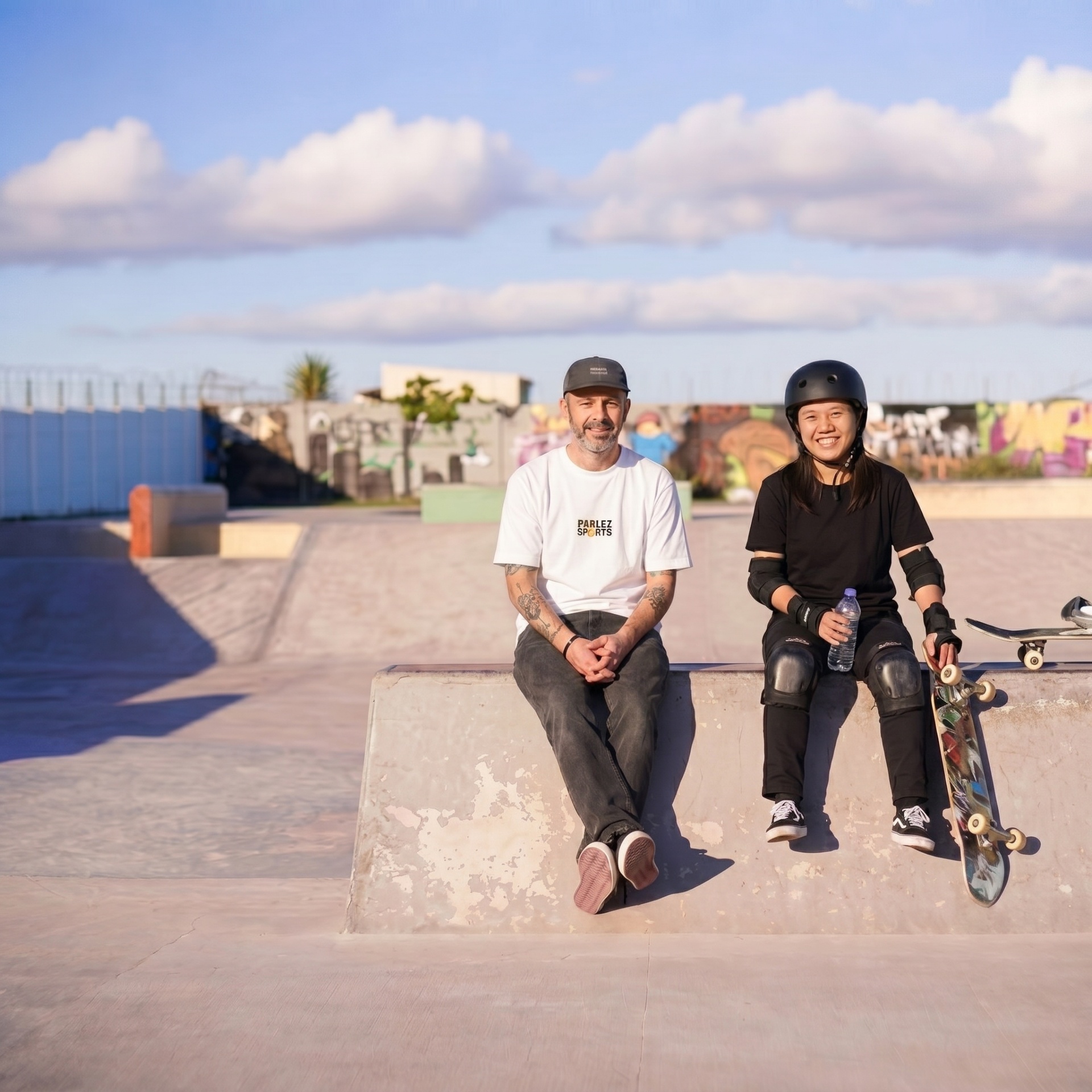 Coach and adult student at the skatepark